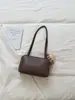 Bolso de axila de nicho de alta gama nuevo para mujer en comercio exterior transfronterizo, bolso cuadrado pequeño texturizado moderno y simple, bolso de hombro para el día a día