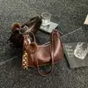 Otoño 2026 Nuevo Elegante Chic Bolso de Hombro de Moda Estilo Bollo Bolso Cruzado de Hombro Único de Alto Valor Bolso Cruzado de Nicho