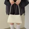 Bolso de axila ligero y lujoso con textura tejida para mujer, nuevo modelo transfronterizo 2026, bolso de mano elegante, bolso de hombro, bolso baguette para el día a día