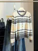 Suéter de punto de cuello redondo con rayas de contraste para mujer, nueva versión coreana de otoño 2026, cárdigan top simple y elegante que estiliza
