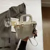 Bolso de Mano para Mujer Moderno y Sencillo 2026 Primavera Nuevo de Moda Elegante Color Sólido Bolso Cruzado Tipo Cubo
