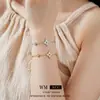Pulsera de Flor Estrella de Circonio Electrochapada en Oro Real Pulsera Simple Versátil de Alta Gama Nicho Lujo Ligero Exquisita Joyería de Mano para Mujer