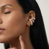 Nuevo juego de cuatro piezas de clip para oreja de perla de lujo ligero de moda transfronteriza de Amazon, pendientes versátiles y elegantes para mujer
