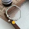 Pulseira de Pérolas com Rosto Sorridente Esmaltado para Mulheres, Design de Nicho Ins de Verão, Pulseira de Alta Qualidade, Joia Versátil Estilo Hyuna para Casais