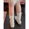 Saia Versátil de Verão com Laço Doce Estilo Coreano Meias Finas Brancas Estilo Ballet e Meias Vazadas para Panturrilha para Mulheres