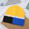 Otoño e invierno nuevo sombrero de color mixto piel de melón amantes fábrica directa sombrero de punto cálido estilo japonés y coreano esencial sombrero de lana venta al por mayor