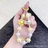 Bolsa de Moda Romántica de Gatito de Caramelo Colorido Llavero Colgante Super Hada Cristal Lanyard para Teléfono Colgante de Perlas