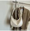 Versão coreana de bolsa dumpling de pele macia 2025 nova textura grande capacidade simples cor sólida comércio exterior transfronteiriço de ombro pequena bolsa
