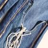 Jeans Flare Azul de Designer Inspirado, Novo Estilo Primavera 2026, Soltinho, com Amarração, Design Único de Nicho para Mulheres