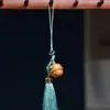 Difusor de bola de bolsita con tallado hueco de sándalo verde creativo con colgante de borla Ruyi, colgante para teléfono móvil, decoración para coche