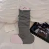 Calcetines tobilleros de lana fina gris para mujer, calcetines con pie para otoño e invierno, combinados con zapatos pequeños de cuero, calcetines largos estilo Miu