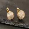 Nuevo diseño de hebilla de oreja redonda geométrica de cobre incrustado de circonio elegante europeo y americano Pendiente de aro brillante para mujer venta al por mayor de fábrica