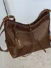Bolso Cruzado de Hombro Vintage de Gran Capacidad para Viajes y Uso Diario 2026 Otoño, con Acabado de Alta Gama, Bolso Tote Cruzado de Nicho