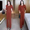 Elegante traje de mujer 2026 otoño nuevo elegante que rejuvenece top de retazos a rayas y pantalones de pierna ancha elegante conjunto de dos piezas moderno
