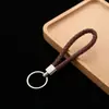 Chaveiro de corda de couro pingente de carro acessórios corda de chave de corda de couro trançado pu para empurrar pequenos presentes fabricantes atacado