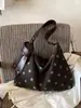 Bolsa tote de bolinhas de grande capacidade, best-seller transfronteiriço, novo modelo 2026 para mulheres, bolsa de ombro versátil de alta qualidade para o dia a dia, moderna