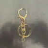 Chaveiro com fecho lagosta, conjunto de fechos lagosta de três peças, conjunto de fechos lagosta de quatro peças, acessórios para chaveiro de corrente de quatro seções atacado
