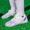 Chuteiras de grama para meninos no atacado, novo modelo de chuteiras de futebol rotativas para treinamento de estudantes infantis, sapatos únicos para meninas para exportação transfronteiriça