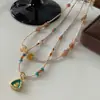 Nuevo Collar de Perlas de Cristal de Fresa Estilo Chino para Mujer 2025 Nueva Cadena de Clavícula Apilada Lujo Accesible Collar de Estilo Antiguo de Gama Alta