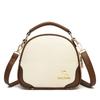 Bolsas 2025 Nova Bolsa Transversal de Ombro Feminina de Alto Padrão com Bordado Versátil para Roupas de Trabalho Pequena Bolsa Redonda de Mão em Couro Macio