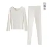 Conjunto de ropa interior térmica de doble protección contra el frío, de hilo ultra fino para mujer, nuevo otoño/invierno, color liso, versátil, amigable con la piel, sin costuras, top y pantalón de otoño para mujer