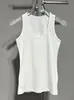 Camiseta sin mangas de punto ajustada con cuello redondo y diseño de nicho, elástica