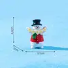 Decorações de Natal em miniatura: uma pequena figura de boneco de neve segurando uma placa, perfeita para criar uma charmosa paisagem de inverno, decorações DIY e pequenos enfeites