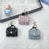 Nuevo Exquisito Mini Estuche para Auriculares Estilo Chanel, Colgante Mini Bolso Textil Colorido, Accesorio de Bolso Pequeño