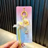 Lindo Colgante de Llavero Carrillón de Viento de Gato 3D con Lazo, Decoración para Bolso, Regalo Pequeño para Niñas, Venta al por Mayor