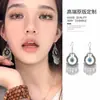Pendientes Exóticos de Venta Caliente, Ganchos de Oreja Artísticos Clásicos Elegantes Vintage, Pendientes Versátiles con Colgante de Borla Hueca de Moda