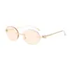 Gafas de sol retro ovaladas sin montura estilo europeo y americano para mujer, hacen que la cara se vea más pequeña, gafas de sol negras de moda casual estilo europeo y americano con protección UV