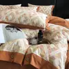 Juego de cuatro piezas simple y de alta gama 100% algodón grueso cepillado para otoño e invierno, ropa de cama cálida estilo botón 100% algodón con estampado digital