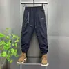 Chegada Nova Calça Casual com Barra Ajustada Masculina Moda Verão e Outono Respirável Cropped Calça Esportiva Versátil Calça Harem com Barra Ajustada
