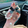 Colgante Creativo para Bolso de Cadena de Perlas, Llavero Exquisito, Estilo Coreano Aleación con Incrustaciones de Diamantes Lazo Llavero de Botella de Perfume para Mujer