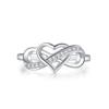 Anillo ilimitado en forma de corazón hueco con chapado de separación de color de moda europea y americana para el mes de Oboro, joyería de circonita explosiva transfronteriza para mujer al por mayor