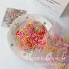 Gomas de Pelo de Goma Gruesas de Colores Coreanas Empacadas al por Mayor Alta Elasticidad No Daña el Cabello Bebé Desechables para Niños y Niñas
