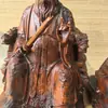 Estatua de azufaifo alcanzado por un rayo del Maestro Zhang Tianshi, una figura del Patriarca Zheng Yi Zhenren con un ojo celestial, estatua sentada de Zhang Daoling de Longhushan
