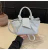 Bolso de mano con estampado de lichi de moda transfronterizo para mujer, nuevo y elegante bolso cubo vintage, bolso de hombro y bandolera de moda