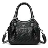 Bolso de Mujer Transfronterizo Nuevo 2026 Otoño Herrajes Textura Tejida Tres Compartimentos Hombro Cruzado de Mano Bolso de Mujer Madre de Edad Media