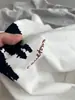 Camiseta de Manga Curta com Estampa de Gato Taihao Wear Flocado para Bater Leite Verão Nova Gola Redonda Jaqueta Casual Feminina
