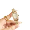 Elegante Reloj de Acero con Banda Completa de Diamantes para Dama con Esfera de Nácar, Diseño de Nicho, Exquisito y Versátil, Lujo Ligero, Reloj de Cuarzo Resistente al Agua al por Mayor