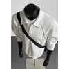 Camisa polo de estilo americano de calle, falso dos piezas, nueva colección de verano y otoño, camiseta de alta gama con tachuelas, sudadera de manga larga con cuello camisero para hombre