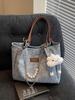 Bolso de mano de gran capacidad para mujer, bolso informal combinable, bolso de mano sencillo de alta gama, 2025