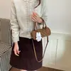 Bolsa Estilo Coreano Super Popular de Nicho com Estampa Floral Feminina 2026 Nova Elegante Versátil Bolsa Transversal Bolsa de Mão Exquisita Bolsa Cilindro