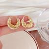 Brincos de fio de torção de metal para mulheres europeias e americanas Niche Twist Design Light Luxury Advanced Sense Gold Plated Earrings Earrings Earrings Buckle Earrings