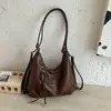 Bolsa de ombro feminina nova e estilosa de grande capacidade para o dia a dia, bolsa de ombro de primavera, bolsa tote, bolsa casual simples retrô