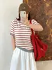 Suéter tejido a rayas vintage para mujer talla grande, colección otoño 2026, camiseta base de cuello redondo de punto holgado con bloques de color para mujer talla grande