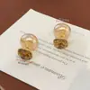 Pendientes Geométricos de Zirconia y Perla Marrones de Doble Uso Otoño e Invierno Nuevos Populares de Moda Tendencia Pendientes de Gama Alta para Mujeres