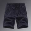 Venta directa de fábrica de pantalones cortos holgados con estampado para hombre, nuevos, para exteriores, de talla grande, informales, de cinco puntos, para playa.