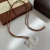 Nuevo Collar de Diseño Retro Estilo Chino Hoja de Ginkgo para Otoño e Invierno Cadena Larga Casual para Suéter Accesorio